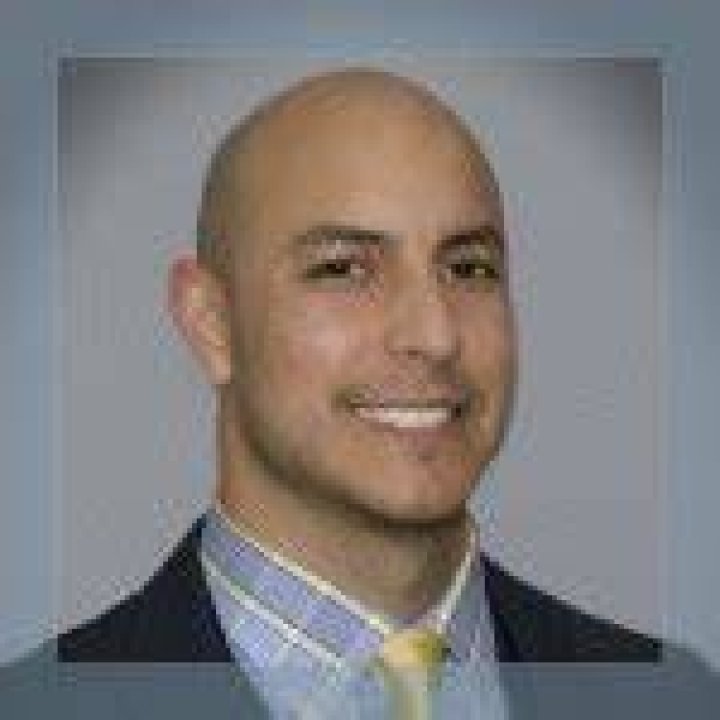 John M. Baca, DPM